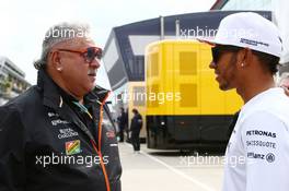 (L to R): Dr. Vijay Mallya (IND) Sahara Force India F1 Team Owner with Lewis Hamilton (GBR) Mercedes AMG F1. 05.07.2014. Formula 1 World Championship, Rd 9, British Grand Prix, Silverstone, England, Qualifying Day.