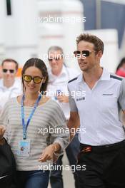 Jenson Button (GBR) McLaren with his girlfriend Jessica Michibata (JPN). 03.07.2014. Formula 1 World Championship, Rd 9, British Grand Prix, Silverstone, England, Preparation Day.