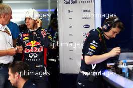 Sebastian Vettel (GER) Red Bull Racing with Dr Helmut Marko (AUT) Red Bull Motorsport Consultant. 18.07.2014. Formula 1 World Championship, Rd 10, German Grand Prix, Hockenheim, Germany, Practice Day.