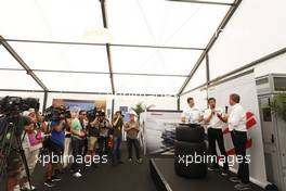 Patrick Dempsey (USA) Actor, taking part in the Porsche Supercup race, with Martin Brundle (GBR) Sky Sports Commentator (Right). 18.07.2014. Formula 1 World Championship, Rd 10, German Grand Prix, Hockenheim, Germany, Practice Day.