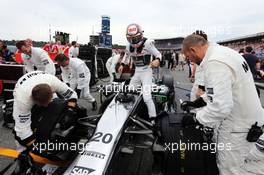 Kevin Magnussen (DEN) McLaren MP4-29 on the grid. 20.07.2014. Formula 1 World Championship, Rd 10, German Grand Prix, Hockenheim, Germany, Race Day.