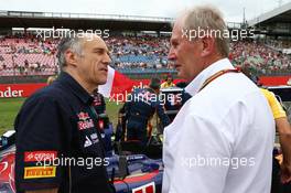 (L to R): Franz Tost (AUT) Scuderia Toro Rosso Team Principal with Dr Helmut Marko (AUT) Red Bull Motorsport Consultant on the grid. 20.07.2014. Formula 1 World Championship, Rd 10, German Grand Prix, Hockenheim, Germany, Race Day.