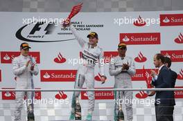 The podium (L to R): Valtteri Bottas (FIN) Williams, second; Nico Rosberg (GER) Mercedes AMG F1, race winner; Lewis Hamilton (GBR) Mercedes AMG F1, third. 20.07.2014. Formula 1 World Championship, Rd 10, German Grand Prix, Hockenheim, Germany, Race Day.