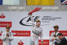 The podium (L to R): Valtteri Bottas (FIN) Williams, second; Nico Rosberg (GER) Mercedes AMG F1, race winner; Lewis Hamilton (GBR) Mercedes AMG F1, third. 20.07.2014. Formula 1 World Championship, Rd 10, German Grand Prix, Hockenheim, Germany, Race Day.