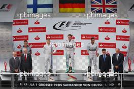 The podium (L to R): Valtteri Bottas (FIN) Williams, second; Nico Rosberg (GER) Mercedes AMG F1, race winner; Lewis Hamilton (GBR) Mercedes AMG F1, third. 20.07.2014. Formula 1 World Championship, Rd 10, German Grand Prix, Hockenheim, Germany, Race Day.