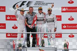 The podium (L to R): Valtteri Bottas (FIN) Williams, second; Nico Rosberg (GER) Mercedes AMG F1, race winner; Lewis Hamilton (GBR) Mercedes AMG F1, third. 20.07.2014. Formula 1 World Championship, Rd 10, German Grand Prix, Hockenheim, Germany, Race Day.