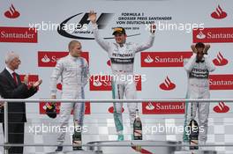 The podium (L to R): Valtteri Bottas (FIN) Williams, second; Nico Rosberg (GER) Mercedes AMG F1, race winner; Lewis Hamilton (GBR) Mercedes AMG F1, third. 20.07.2014. Formula 1 World Championship, Rd 10, German Grand Prix, Hockenheim, Germany, Race Day.