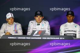 The post race FIA Press Conference (L to R): Valtteri Bottas (FIN) Williams, second; Nico Rosberg (GER) Mercedes AMG F1, race winner; Lewis Hamilton (GBR) Mercedes AMG F1, third. 20.07.2014. Formula 1 World Championship, Rd 10, German Grand Prix, Hockenheim, Germany, Race Day.