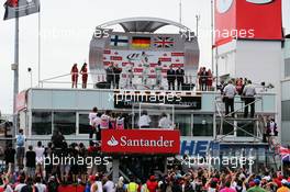 The podium (L to R): Valtteri Bottas (FIN) Williams, second; Nico Rosberg (GER) Mercedes AMG F1, race winner; Lewis Hamilton (GBR) Mercedes AMG F1, third. 20.07.2014. Formula 1 World Championship, Rd 10, German Grand Prix, Hockenheim, Germany, Race Day.