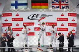 The podium (L to R): Valtteri Bottas (FIN) Williams, second; Nico Rosberg (GER) Mercedes AMG F1, race winner; Lewis Hamilton (GBR) Mercedes AMG F1, third. 20.07.2014. Formula 1 World Championship, Rd 10, German Grand Prix, Hockenheim, Germany, Race Day.