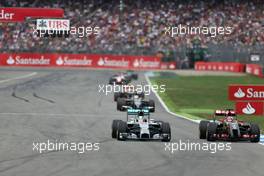 Lewis Hamilton (GBR), Mercedes AMG F1 Team and Romain Grosjean (FRA), Lotus F1 Team  20.07.2014. Formula 1 World Championship, Rd 10, German Grand Prix, Hockenheim, Germany, Race Day.