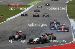 Sergio Perez (MEX) Sahara Force India F1 VJM07 and Daniil Kvyat (RUS) Scuderia Toro Rosso STR9. 20.07.2014. Formula 1 World Championship, Rd 10, German Grand Prix, Hockenheim, Germany, Race Day.