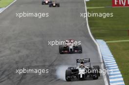 Kevin Magnussen (DEN) McLaren MP4-29 locks up under braking. 20.07.2014. Formula 1 World Championship, Rd 10, German Grand Prix, Hockenheim, Germany, Race Day.