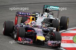 Daniel Ricciardo (AUS) Red Bull Racing RB10 leads Lewis Hamilton (GBR) Mercedes AMG F1 W05. 20.07.2014. Formula 1 World Championship, Rd 10, German Grand Prix, Hockenheim, Germany, Race Day.