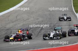 Daniel Ricciardo (AUS) Red Bull Racing RB10 and Lewis Hamilton (GBR) Mercedes AMG F1 W05 battle for position. 20.07.2014. Formula 1 World Championship, Rd 10, German Grand Prix, Hockenheim, Germany, Race Day.