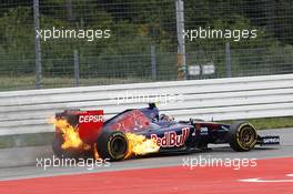 Daniil Kvyat (RUS) Scuderia Toro Rosso STR9 catches fire and retires from the race. 20.07.2014. Formula 1 World Championship, Rd 10, German Grand Prix, Hockenheim, Germany, Race Day.