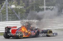 Daniil Kvyat (RUS) Scuderia Toro Rosso STR9 catches fire and retires from the race. 20.07.2014. Formula 1 World Championship, Rd 10, German Grand Prix, Hockenheim, Germany, Race Day.