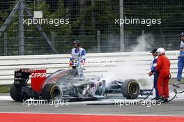 Daniil Kvyat (RUS) Scuderia Toro Rosso STR9 catches fire and retires from the race. 20.07.2014. Formula 1 World Championship, Rd 10, German Grand Prix, Hockenheim, Germany, Race Day.