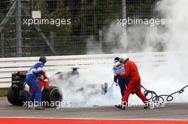 Daniil Kvyat (RUS) Scuderia Toro Rosso STR9 catches fire and retires from the race. 20.07.2014. Formula 1 World Championship, Rd 10, German Grand Prix, Hockenheim, Germany, Race Day.