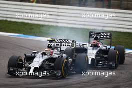 Kevin Magnussen (DEN) McLaren MP4-29 leads team mate Jenson Button (GBR) McLaren MP4-29. 20.07.2014. Formula 1 World Championship, Rd 10, German Grand Prix, Hockenheim, Germany, Race Day.