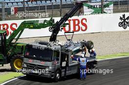 The Mercedes AMG F1 W05 of Lewis Hamilton (GBR) Mercedes AMG F1 is is recovered back to the pits on the back of a truck after he crashed out of qualifying. 19.07.2014. Formula 1 World Championship, Rd 10, German Grand Prix, Hockenheim, Germany, Qualifying Day.