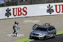 Lewis Hamilton (GBR) Mercedes AMG F1 walks to the Medical Car after he crashed out of qualifying. 19.07.2014. Formula 1 World Championship, Rd 10, German Grand Prix, Hockenheim, Germany, Qualifying Day.