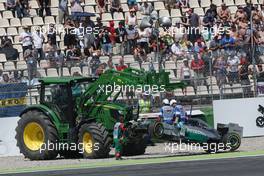 The Mercedes AMG F1 W05 of Lewis Hamilton (GBR) Mercedes AMG F1 is craned away after he crashed out of the first session of qualifying. 19.07.2014. Formula 1 World Championship, Rd 10, German Grand Prix, Hockenheim, Germany, Qualifying Day.