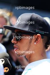 Lewis Hamilton (GBR) Mercedes AMG F1 with the media. 19.07.2014. Formula 1 World Championship, Rd 10, German Grand Prix, Hockenheim, Germany, Qualifying Day.