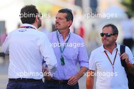 Guenther Steiner (ITA) Haas F1 Team Prinicipal (Centre) with Matteo Bonciani (ITA) FIA Media Delegate (Left). 19.07.2014. Formula 1 World Championship, Rd 10, German Grand Prix, Hockenheim, Germany, Qualifying Day.