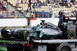 The Mercedes AMG F1 W05 of Lewis Hamilton (GBR) Mercedes AMG F1 is recovered back to the pits on the back of a truck after he crashed out of the first session of qualifying. 19.07.2014. Formula 1 World Championship, Rd 10, German Grand Prix, Hockenheim, Germany, Qualifying Day.