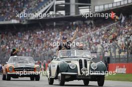 Daniil Kvyat (RUS) Scuderia Toro Rosso on the drivers parade. 20.07.2014. Formula 1 World Championship, Rd 10, German Grand Prix, Hockenheim, Germany, Race Day.