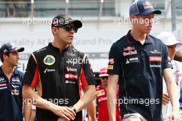 (L to R): Pastor Maldonado (VEN) Lotus F1 Team and Daniil Kvyat (RUS) Scuderia Toro Rosso on the drivers parade. 20.07.2014. Formula 1 World Championship, Rd 10, German Grand Prix, Hockenheim, Germany, Race Day.