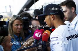 Lewis Hamilton (GBR) Mercedes AMG F1 with the media. 17.07.2014. Formula 1 World Championship, Rd 10, German Grand Prix, Hockenheim, Germany, Preparation Day.