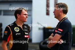 (L to R): Alan Permane (GBR) Lotus F1 Team Trackside Operations Director with Steve Nielsen (GBR) Scuderia Toro Rosso Sporting Director. 25.07.2014. Formula 1 World Championship, Rd 11, Hungarian Grand Prix, Budapest, Hungary, Practice Day.
