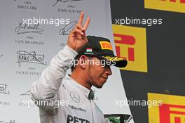 Lewis Hamilton (GBR) Mercedes AMG F1 celebrates his third position on the podium. 27.07.2014. Formula 1 World Championship, Rd 11, Hungarian Grand Prix, Budapest, Hungary, Race Day.