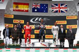 1st place Daniel Ricciardo (AUS) Red Bull Racing RB10, 2nd place Fernando Alonso (ESP) Ferrari and 3rd place Lewis Hamilton (GBR) Mercedes AMG F1. 27.07.2014. Formula 1 World Championship, Rd 11, Hungarian Grand Prix, Budapest, Hungary, Race Day.
