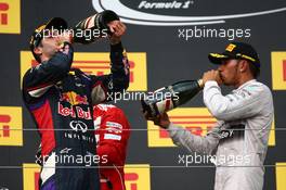 1st place Daniel Ricciardo (AUS) Red Bull Racing and 3rd place Lewis Hamilton (GBR) Mercedes AMG F1. 27.07.2014. Formula 1 World Championship, Rd 11, Hungarian Grand Prix, Budapest, Hungary, Race Day.