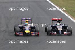 Sebastian Vettel (GER), Red Bull Racing and Jean-Eric Vergne (FRA), Scuderia Toro Rosso   27.07.2014. Formula 1 World Championship, Rd 11, Hungarian Grand Prix, Budapest, Hungary, Race Day.