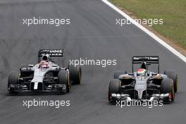 Jenson Button (GBR), McLaren F1 Team and Adrian Sutil (GER), Sauber F1 Team  27.07.2014. Formula 1 World Championship, Rd 11, Hungarian Grand Prix, Budapest, Hungary, Race Day.