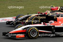 Jules Bianchi (FRA), Marussia F1 Team  and Pastor Maldonado (VEN), Lotus F1 Team  27.07.2014. Formula 1 World Championship, Rd 11, Hungarian Grand Prix, Budapest, Hungary, Race Day.