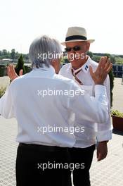 Bernie Ecclestone (GBR) with Peter Gerstl (HUN) Hungaroring Circuit. 26.07.2014. Formula 1 World Championship, Rd 11, Hungarian Grand Prix, Budapest, Hungary, Qualifying Day.