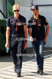 (L to R): Stuart Smith (AUS) Red Bull Racing Physio with Daniel Ricciardo (AUS) Red Bull Racing. 26.07.2014. Formula 1 World Championship, Rd 11, Hungarian Grand Prix, Budapest, Hungary, Qualifying Day.