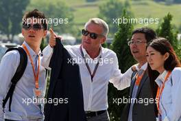 Robbie Cao (Left) with Marcello Lotti (ITA) Former WTCC General Manager (Centre). 26.07.2014. Formula 1 World Championship, Rd 11, Hungarian Grand Prix, Budapest, Hungary, Qualifying Day.