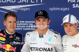 ,Sebastian Vettel (GER), Red Bull Racing  Nico Rosberg (GER), Mercedes AMG F1 Team and Valtteri Bottas (FIN), Williams F1 Team  26.07.2014. Formula 1 World Championship, Rd 11, Hungarian Grand Prix, Budapest, Hungary, Qualifying Day.