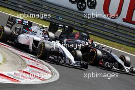 (L to R): Valtteri Bottas (FIN) Williams FW36 and Adrian Sutil (GER) Sauber C33. 26.07.2014. Formula 1 World Championship, Rd 11, Hungarian Grand Prix, Budapest, Hungary, Qualifying Day.