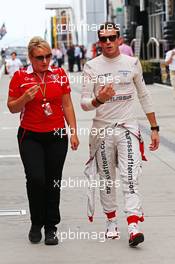 Jules Bianchi (FRA) Marussia F1 Team with Tracy Novak (GBR) Marussia F1 Team PR & Communications Director. 26.07.2014. Formula 1 World Championship, Rd 11, Hungarian Grand Prix, Budapest, Hungary, Qualifying Day.