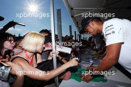 Lewis Hamilton (GBR) Mercedes AMG F1 signs autographs for the fans. 24.07.2014. Formula 1 World Championship, Rd 11, Hungarian Grand Prix, Budapest, Hungary, Preparation Day.