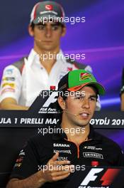 Sergio Perez (MEX) Sahara Force India F1 and Esteban Gutierrez (MEX) Sauber in the FIA Press Conference. 24.07.2014. Formula 1 World Championship, Rd 11, Hungarian Grand Prix, Budapest, Hungary, Preparation Day.