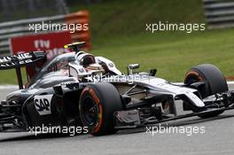 Kevin Magnussen (DEN) McLaren MP4-29 with loose cockpit protection. 05.09.2014. Formula 1 World Championship, Rd 13, Italian Grand Prix, Monza, Italy, Practice Day.