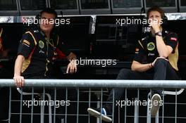 (L to R): Federico Gastaldi (ARG) Lotus F1 Team Deputy Team Principal with Romain Grosjean (FRA) Lotus F1 Team on the pit gantry. 05.09.2014. Formula 1 World Championship, Rd 13, Italian Grand Prix, Monza, Italy, Practice Day.